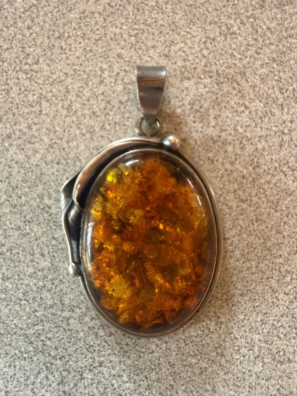 Oval Amber Pendant in Silver Tone